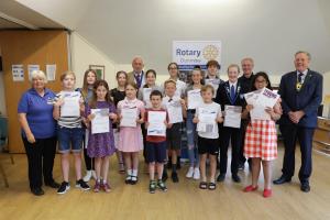 Award winners with, from left to right, Dunmow Rotary Youth Competition co-ordinator Jenny Versey, Deputy Mayor Councillor Mike Coleman, Rotary District Youth Lead Peter Dowse and Dunmow Rotary President Michael Chapman.   